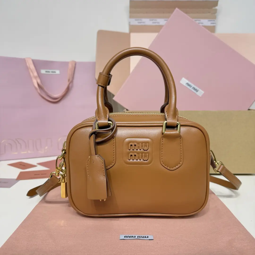 5BB123: MiuMiu's new too pretty bowling handbag, featuring