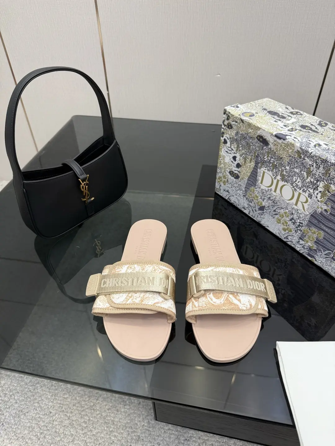 one hundred and sixty
Dior Beach Slippers: One piece molded outsole with adjustable instep Velcro