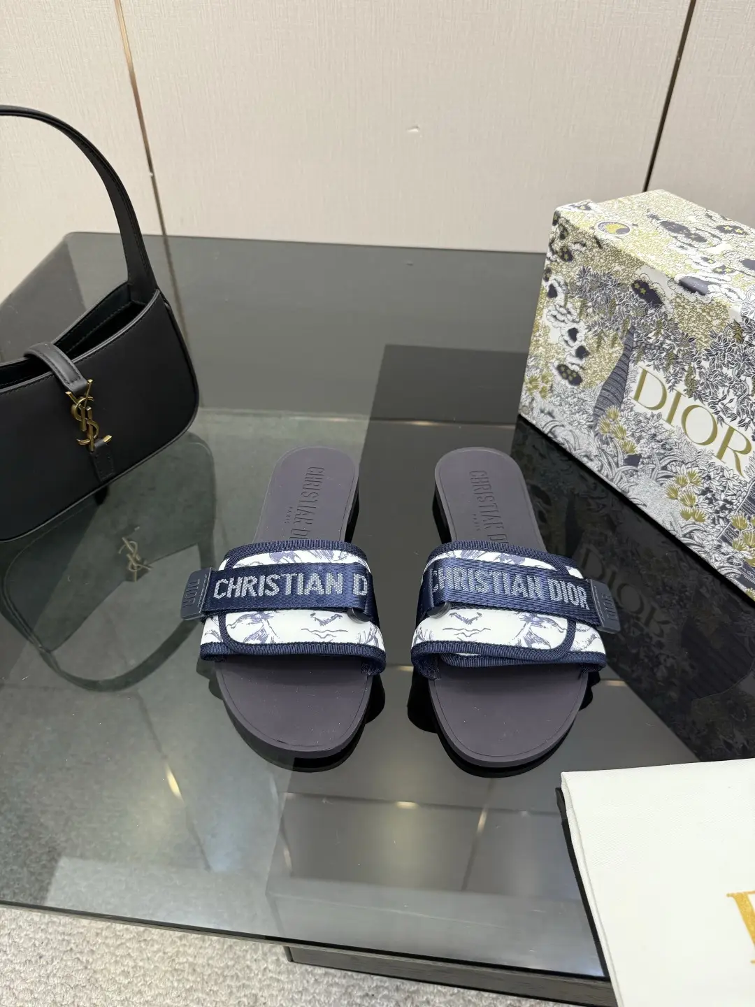 one hundred and sixty
Dior Beach Slippers: One piece molded outsole with adjustable instep Velcro
