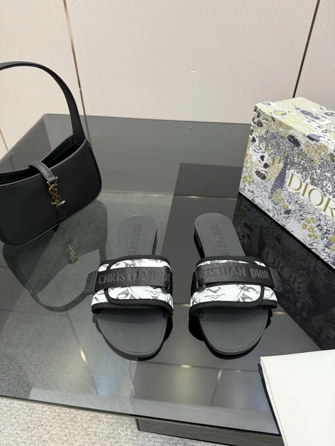 one hundred and sixty
Dior Beach Slippers: One piece molded outsole with adjustable instep Velcro