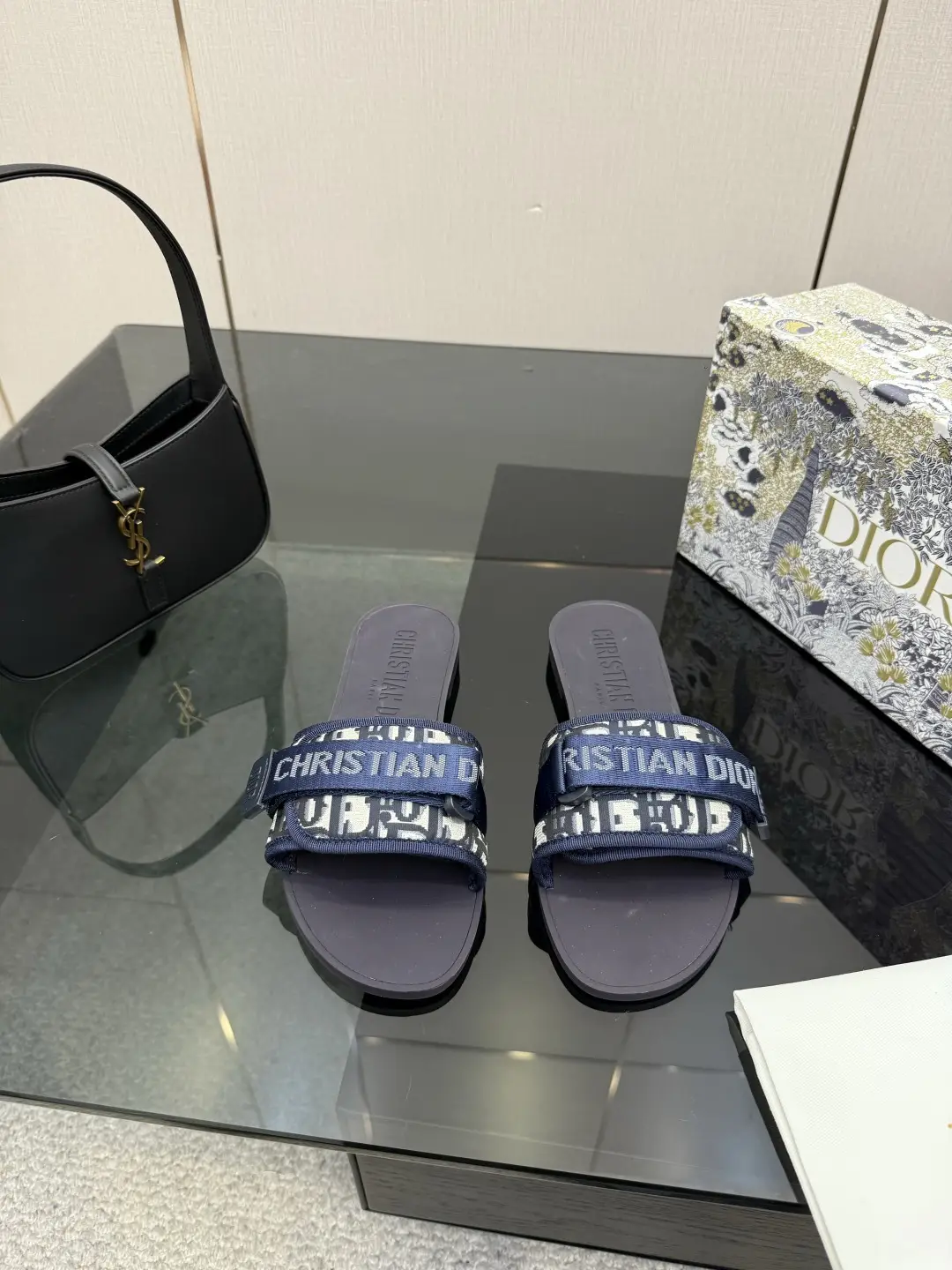one hundred and sixty
Dior Beach Slippers: One piece molded outsole with adjustable instep Velcro