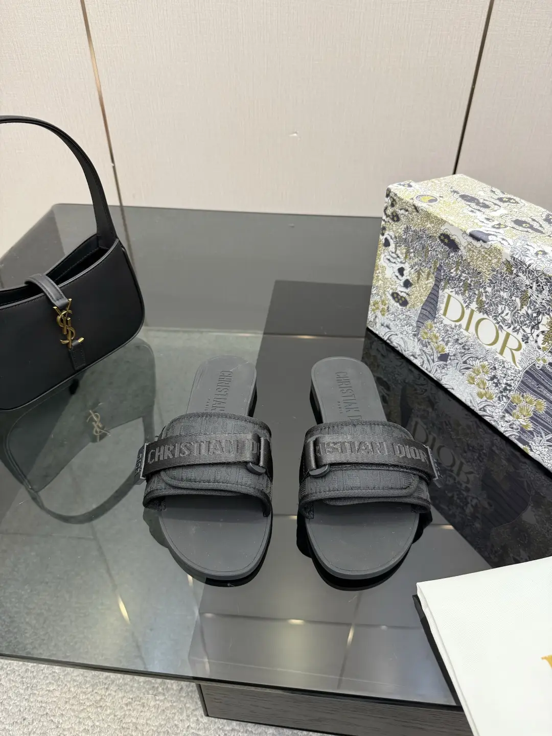 one hundred and sixty
Dior Beach Slippers: One piece molded outsole with adjustable instep Velcro