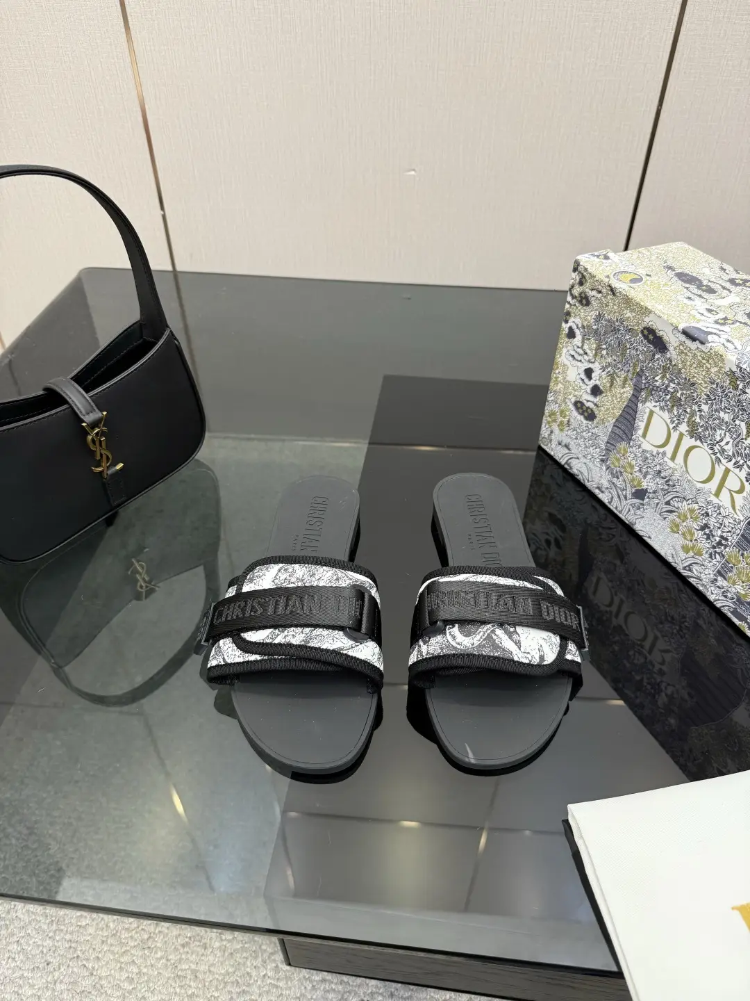 one hundred and sixty
Dior Beach Slippers: One piece molded outsole with adjustable instep Velcro