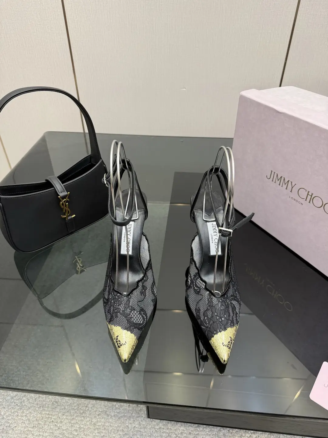 two hundred and ninety
Jimmy Choo Week 26WF New Products
Lace metal head