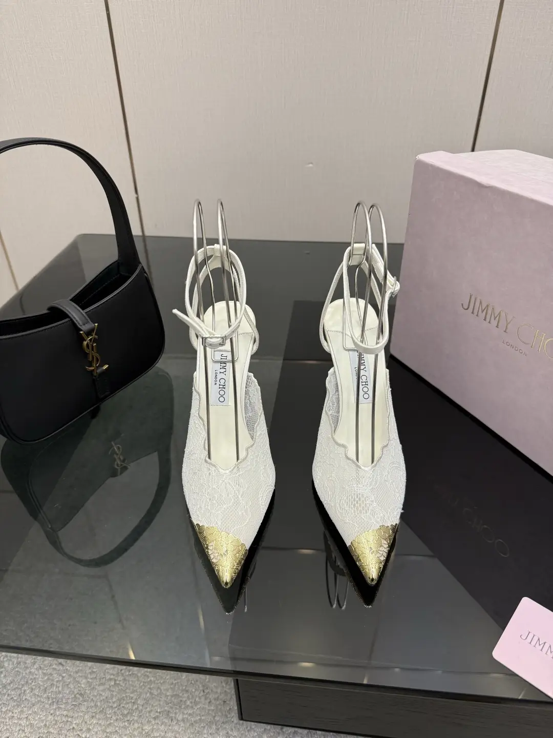 two hundred and ninety
Jimmy Choo Week 26WF New Products
Lace metal head