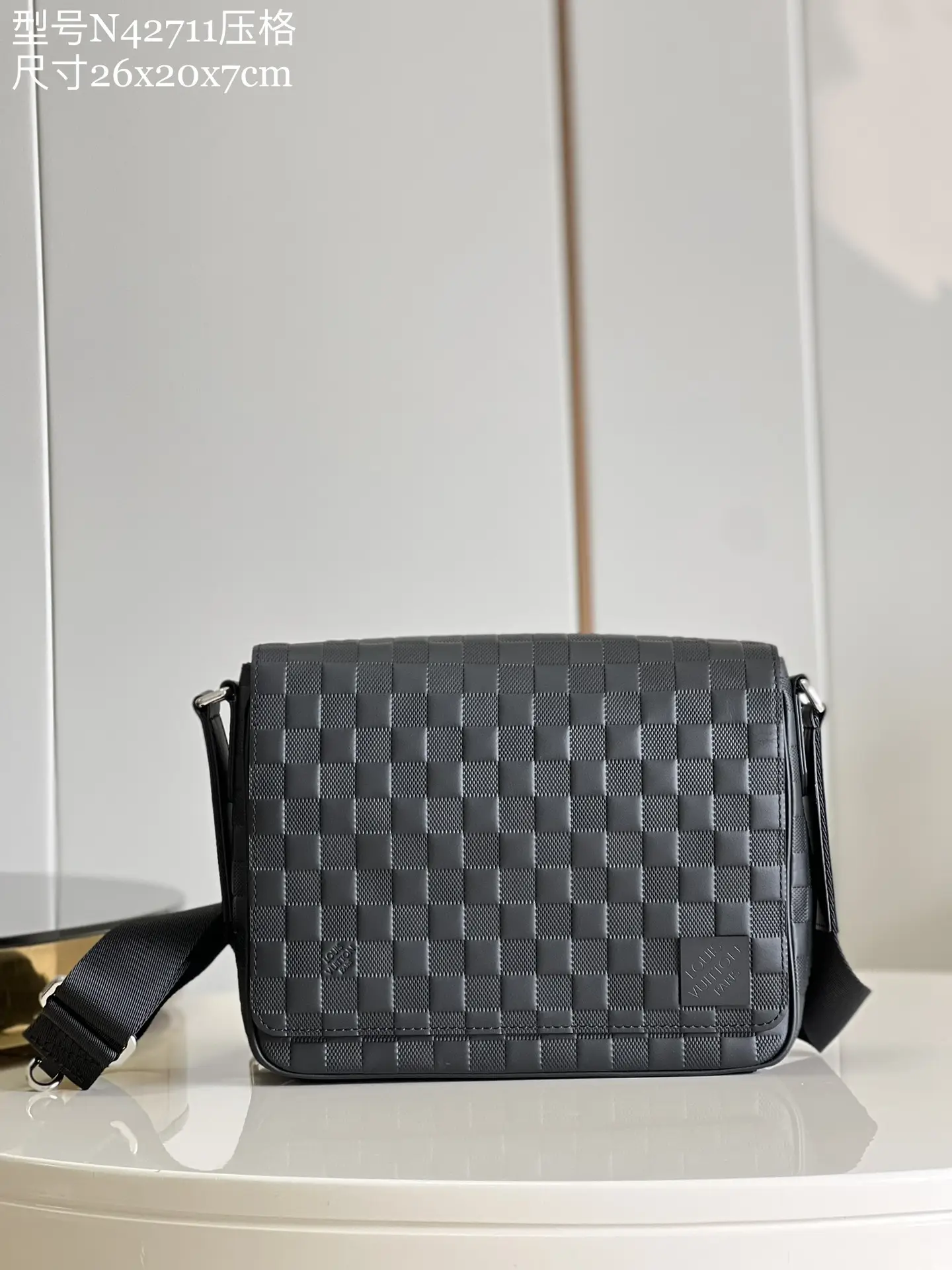 N42711 Pressing Grid District Small Postman Bag Made from Damie