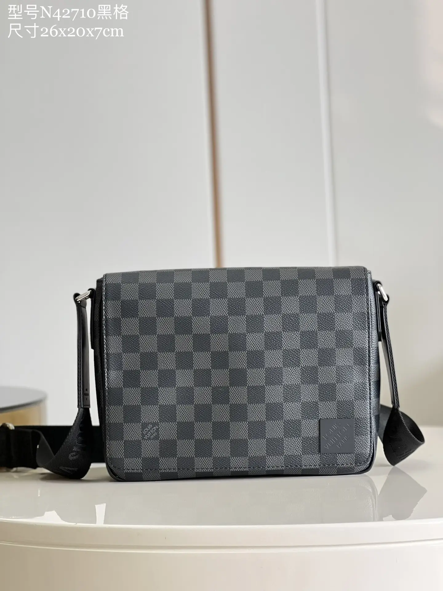 N42710 Black Grid District Small Postman Bag Compared to Previous Version