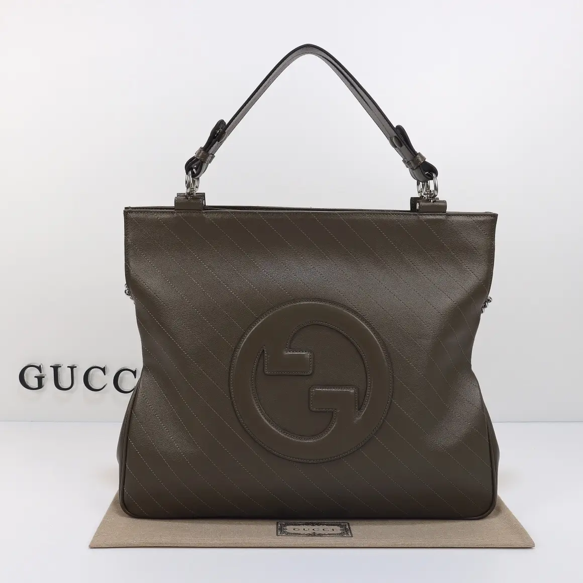 Gucci， Original leather, style 751516 gray leather size: width 34