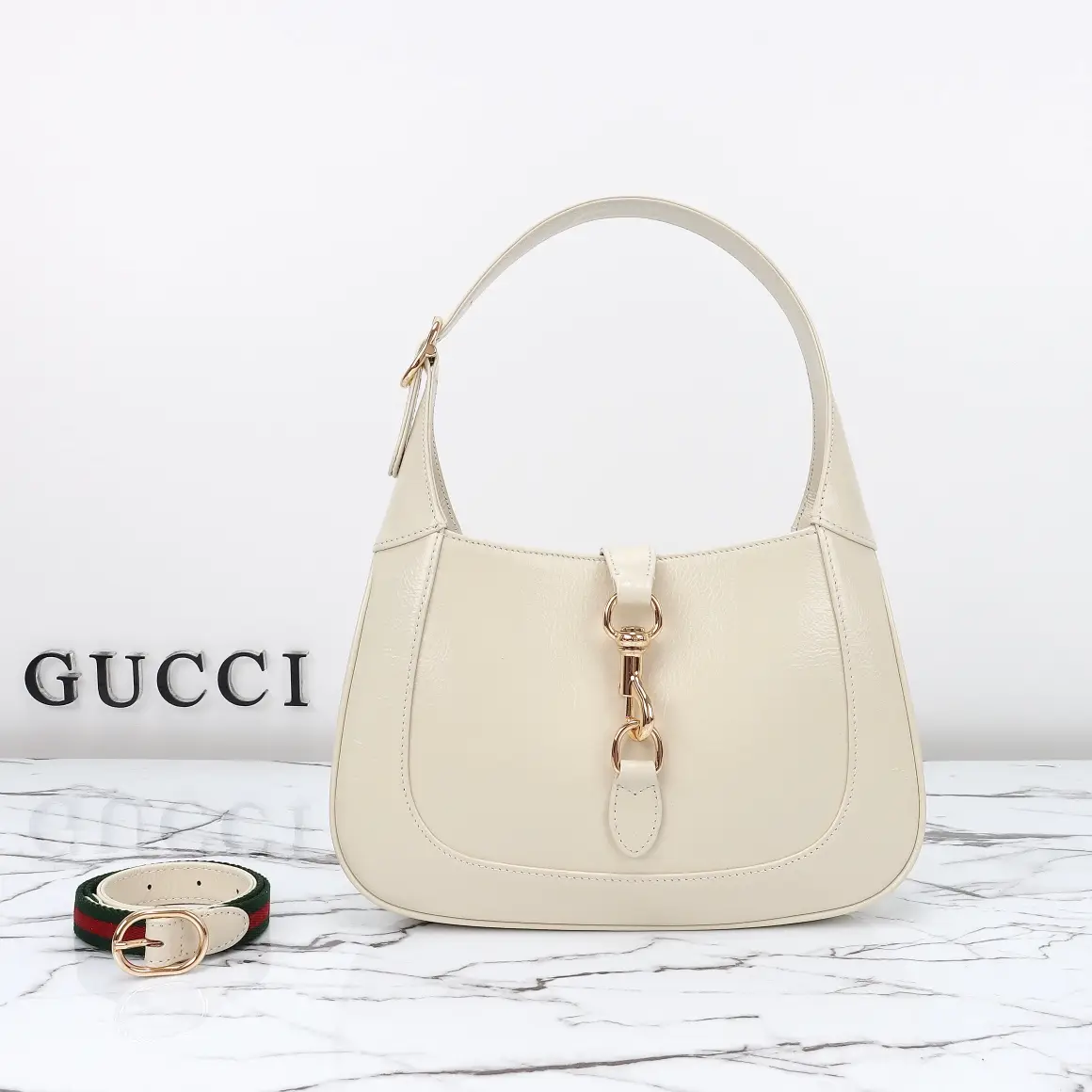 Gucci， Original leather, model number 782849 white patent leather size: width 27