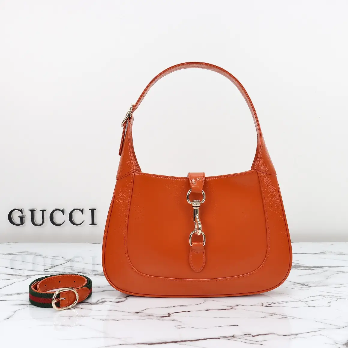Gucci， Original leather, model number 782849, orange lacquered leather size: width 27