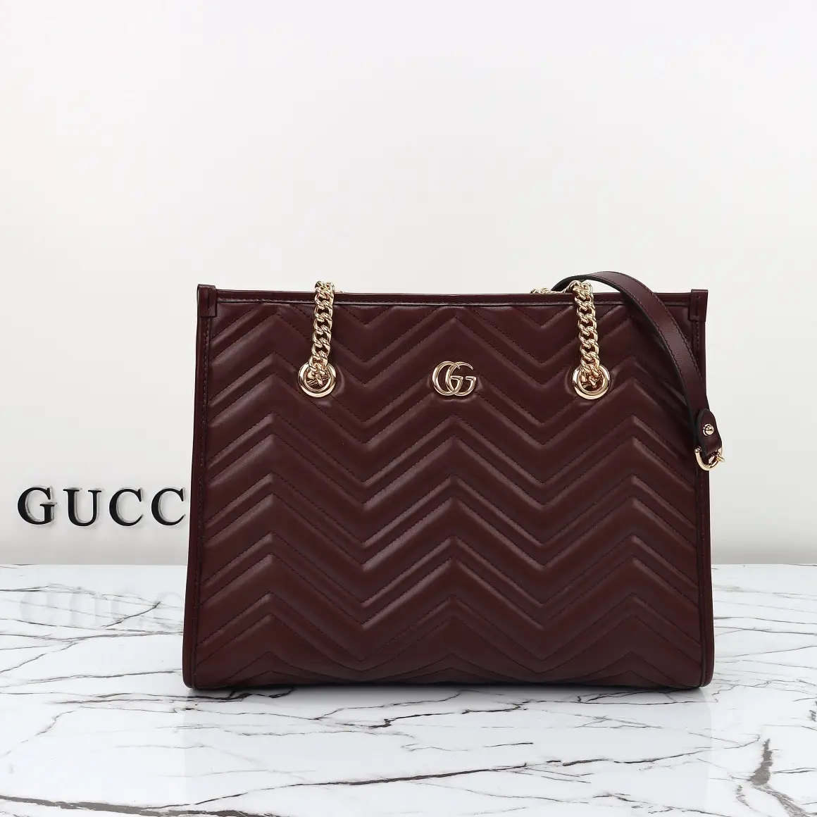 Gucci， Original leather, style number 779724, wine red