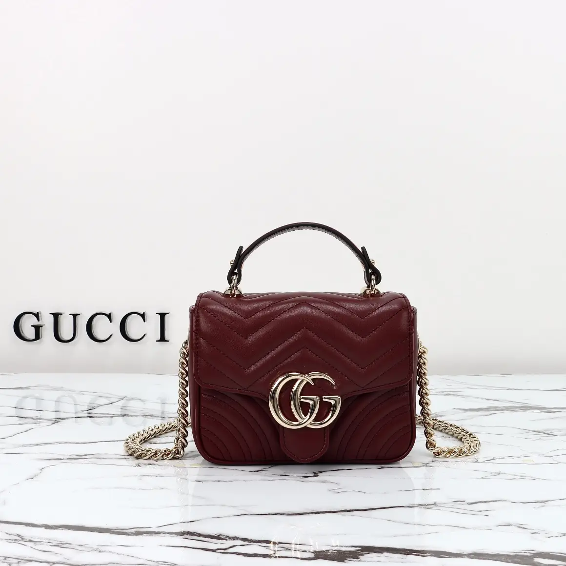 Gucci， Original leather, style number 811238, wine red
