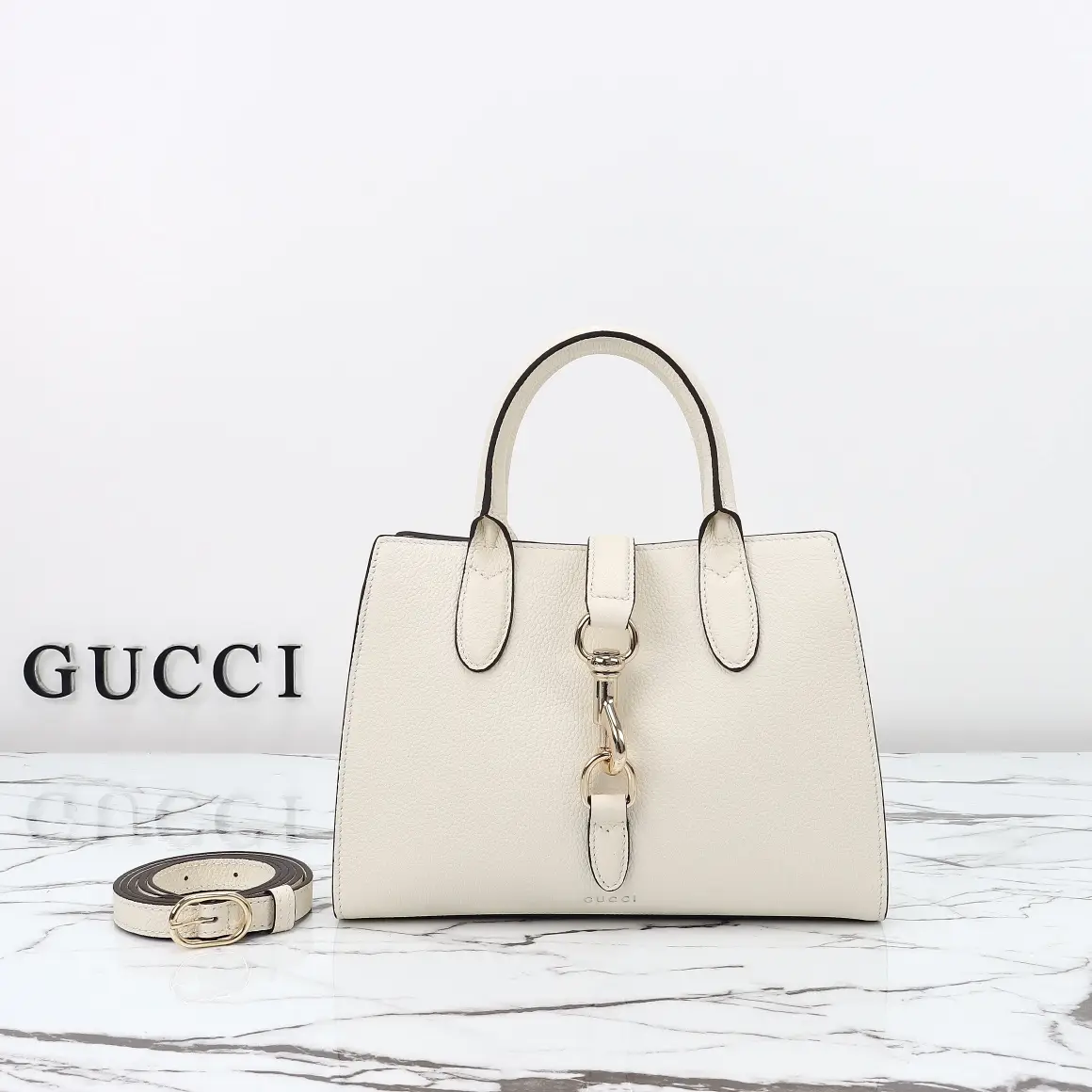Gucci， Original leather, style 795349 white leather size: 24x wide
