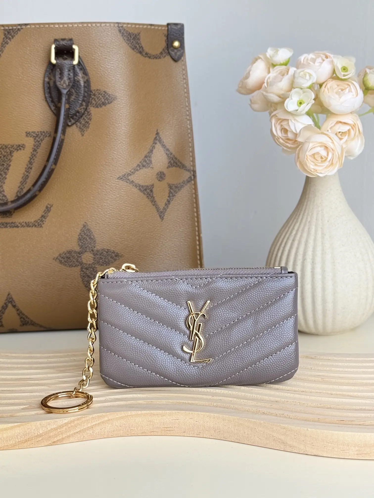 200 SAINT LAURENT ball patterned cowhide mini change