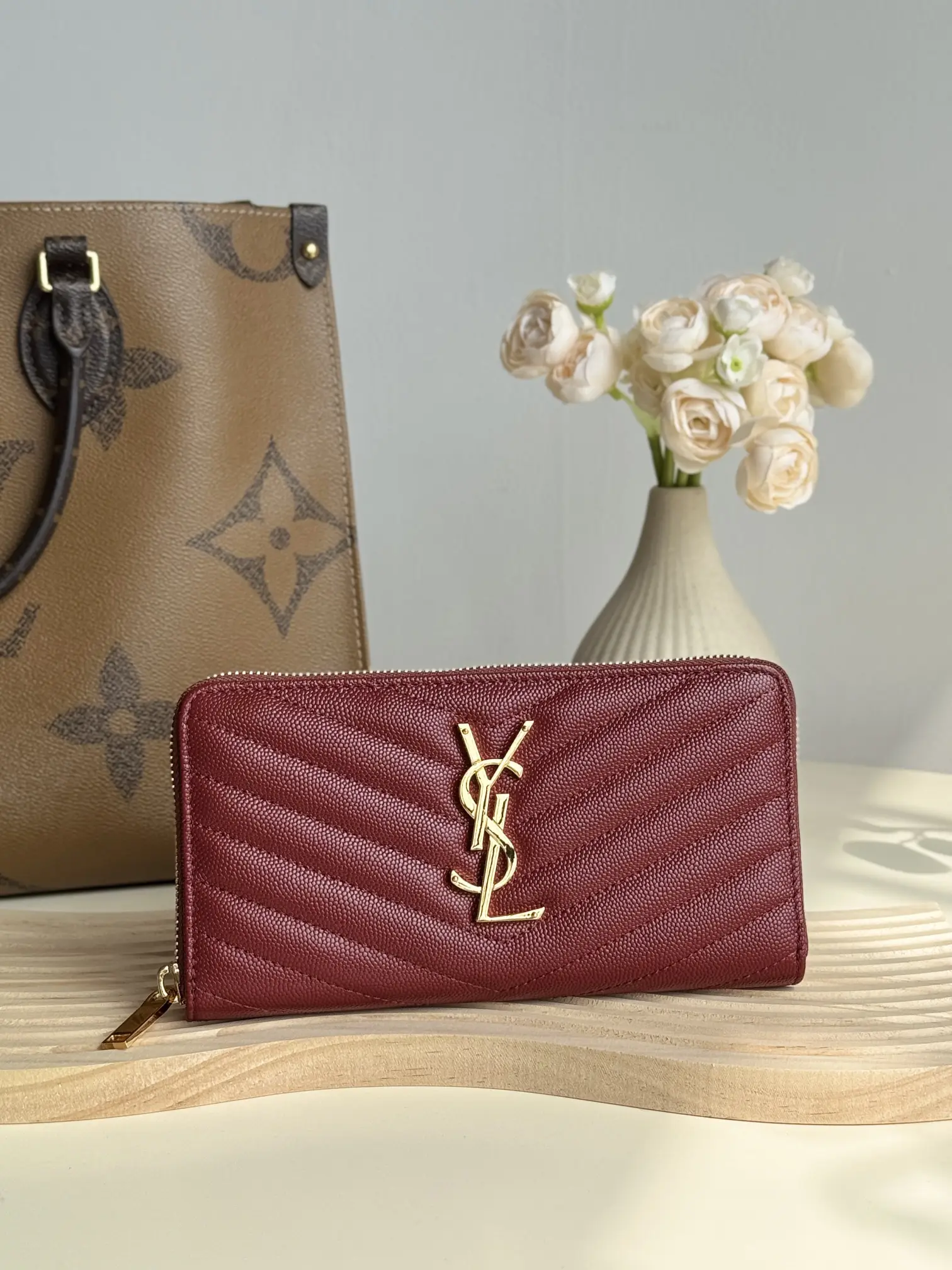 320 YSL Zipper Wallet with 12 card slots, 1 zipper pocket, and 2 banknote compartments