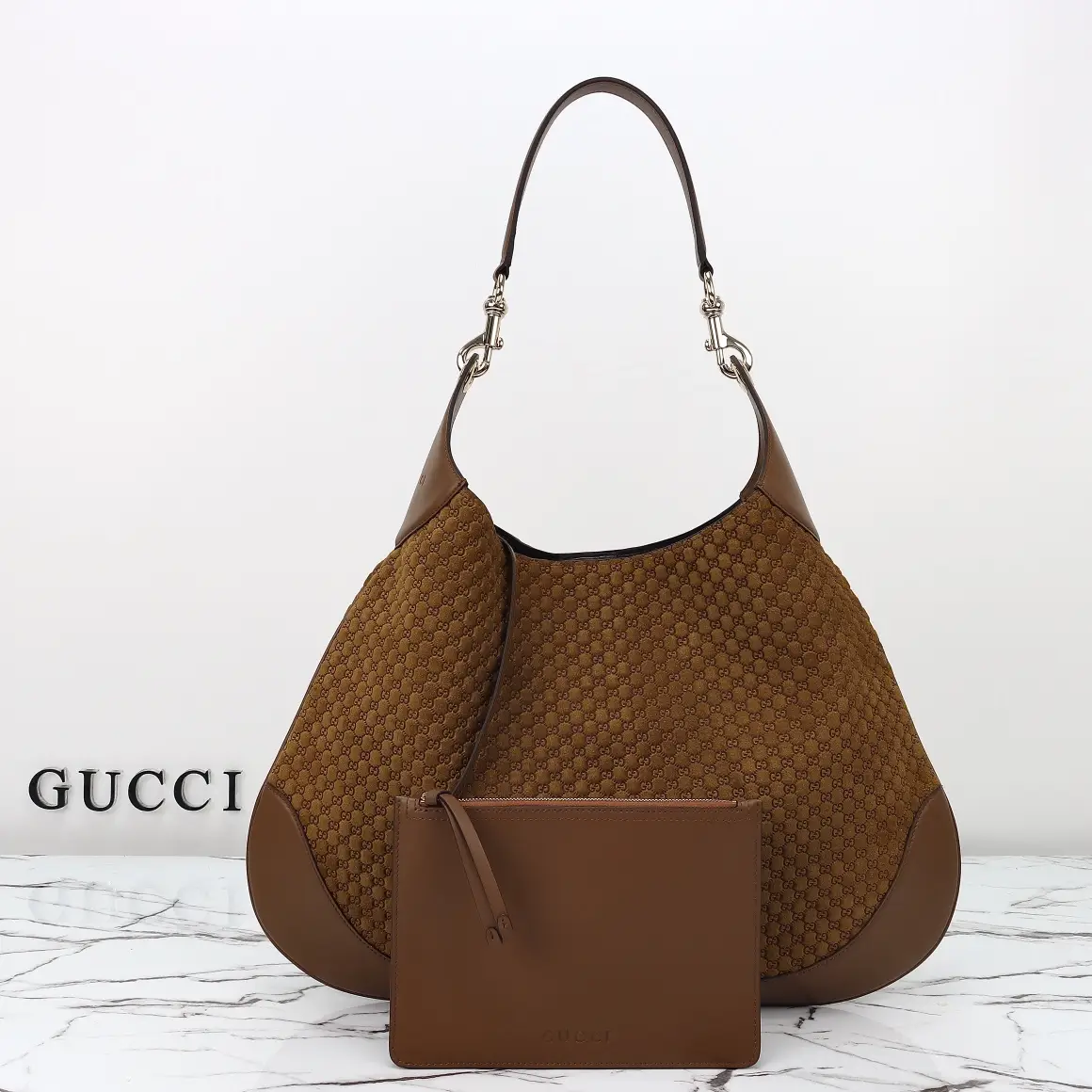 Gucci， Original leather, style 815924 brown frosted size: width 49