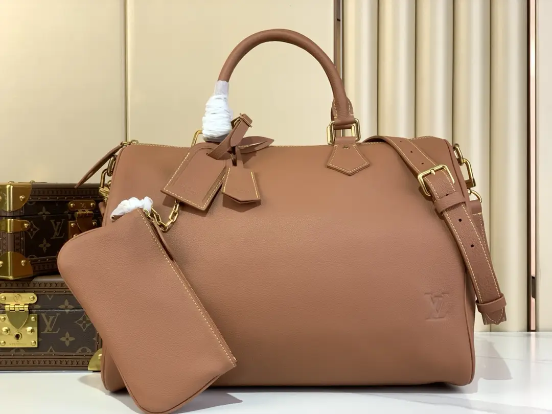 SPEEDY BANDOULI È RE40 handbag M12672 brown
this