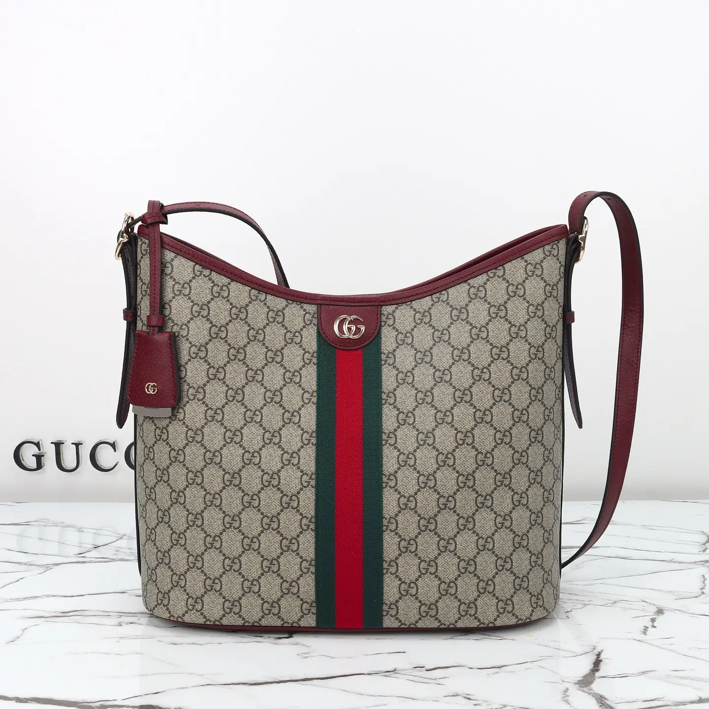 Gucci， Original leather, style 836871 brown red size: width 33