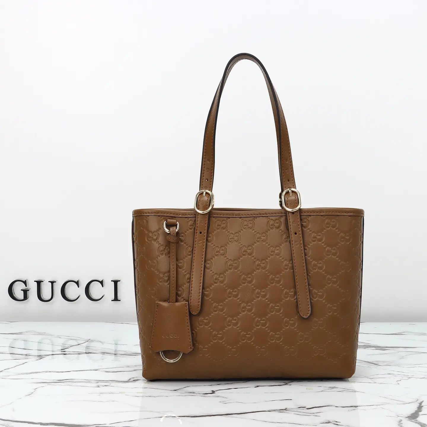 Gucci， Original leather, style 847456 brown press