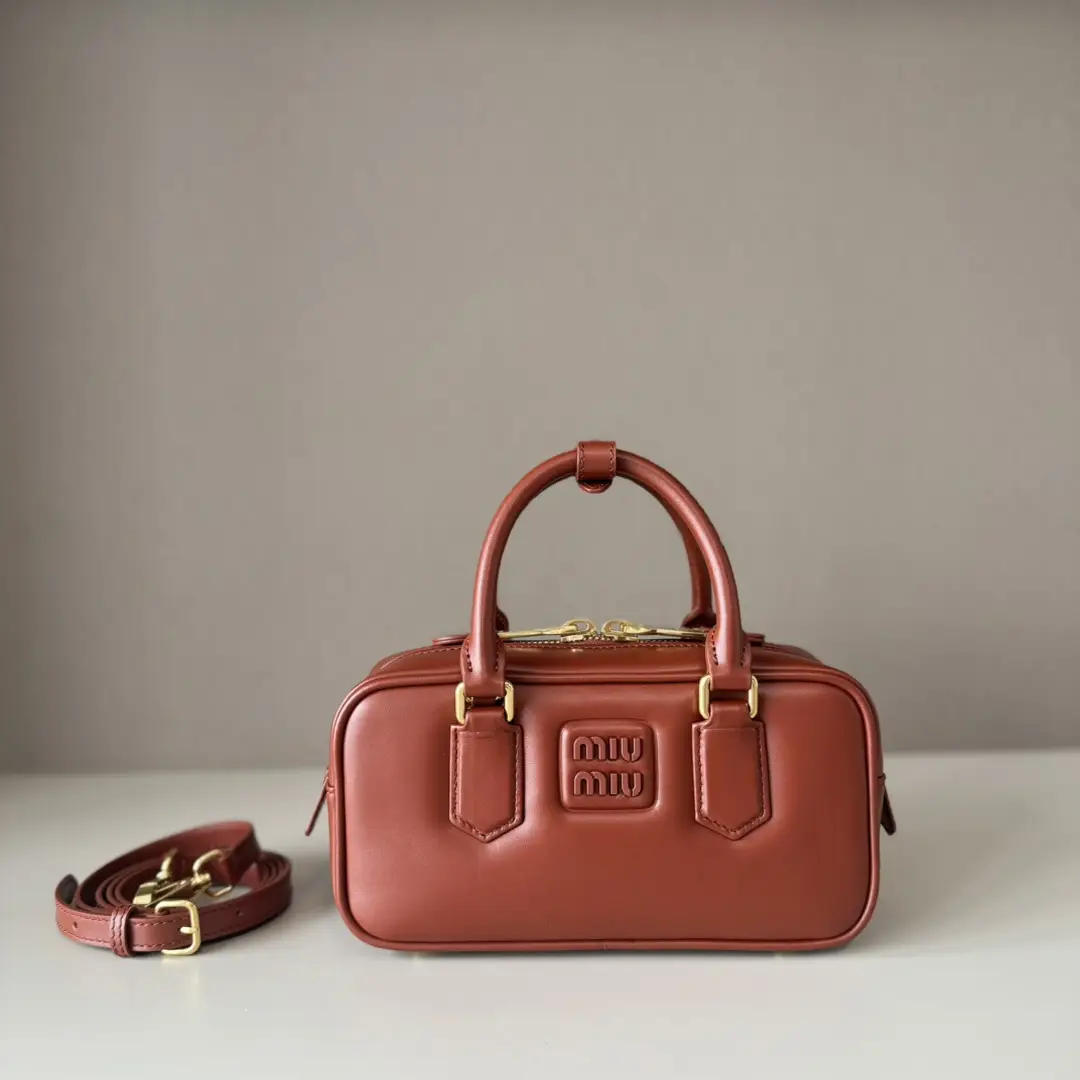 Rose Brown 5BB142, Miu's new bowling bag, featured on the official website, is definitely going viral this year