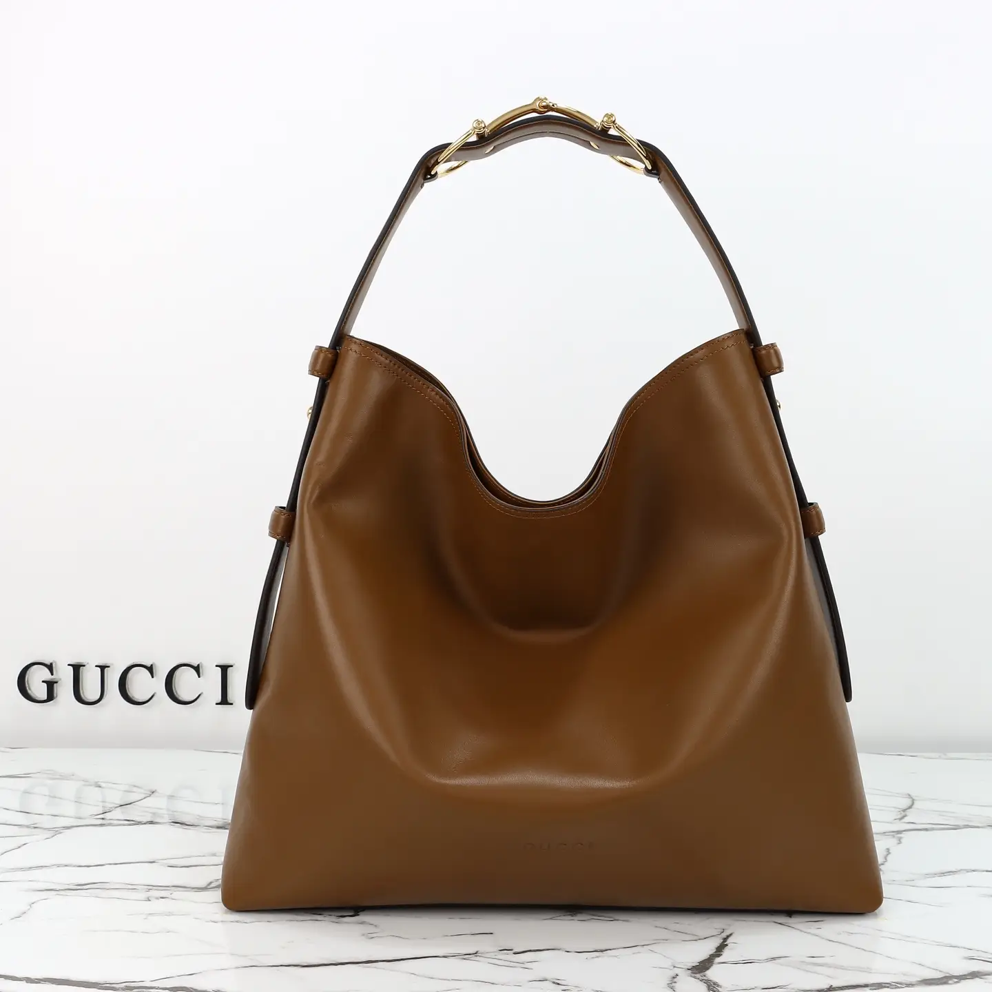 Gucci， Original leather, style 850546 brown leather size: 40x wide