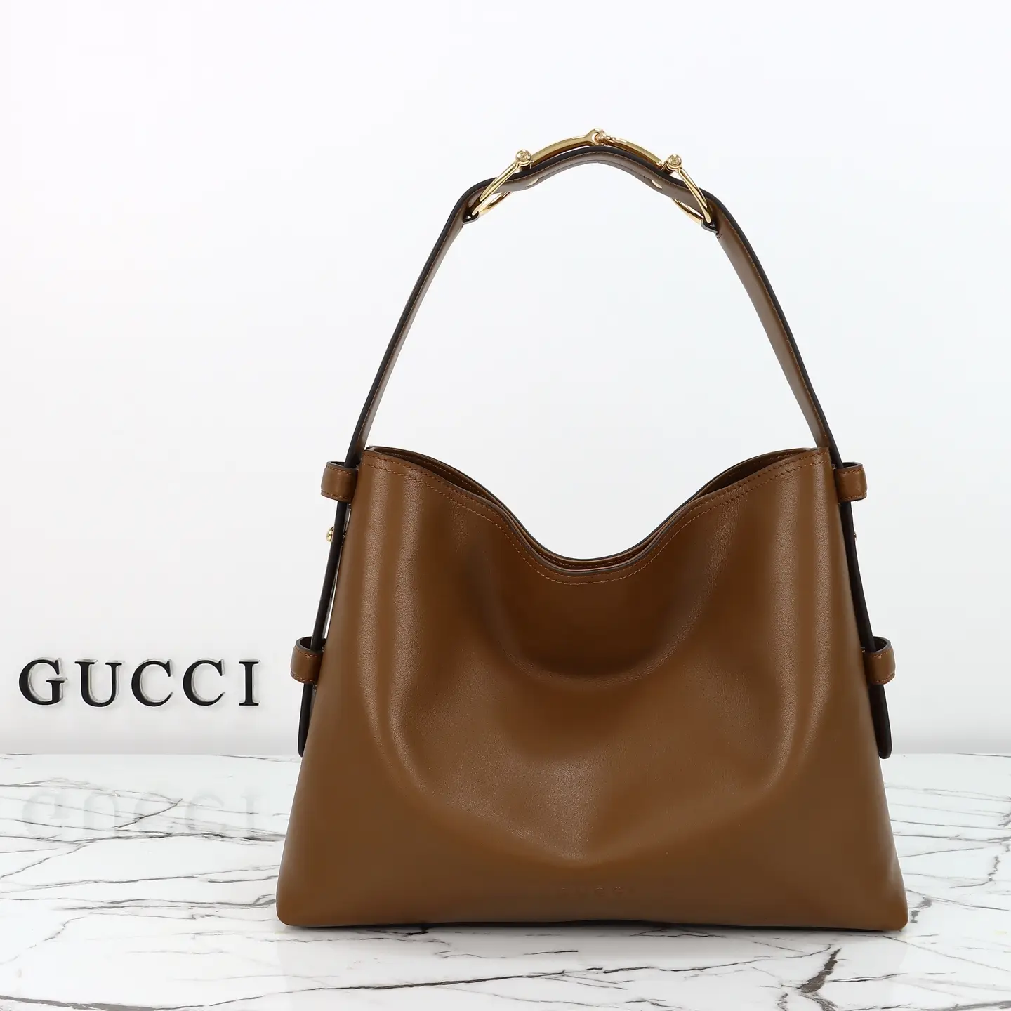 Gucci， Original leather, style 850926 brown leather size: 35x wide