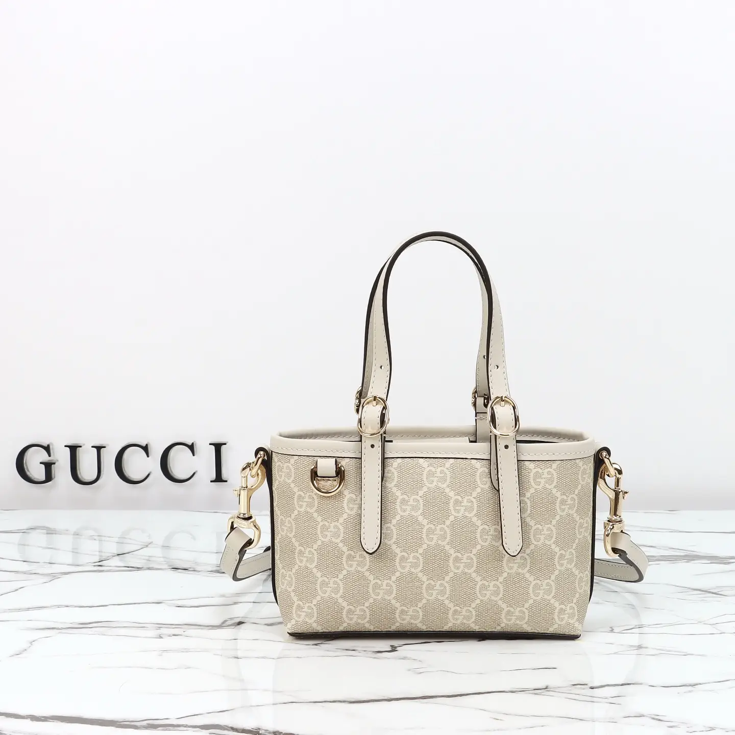 Gucci， Original leather, model number 855491 Brown White Size: Width 17