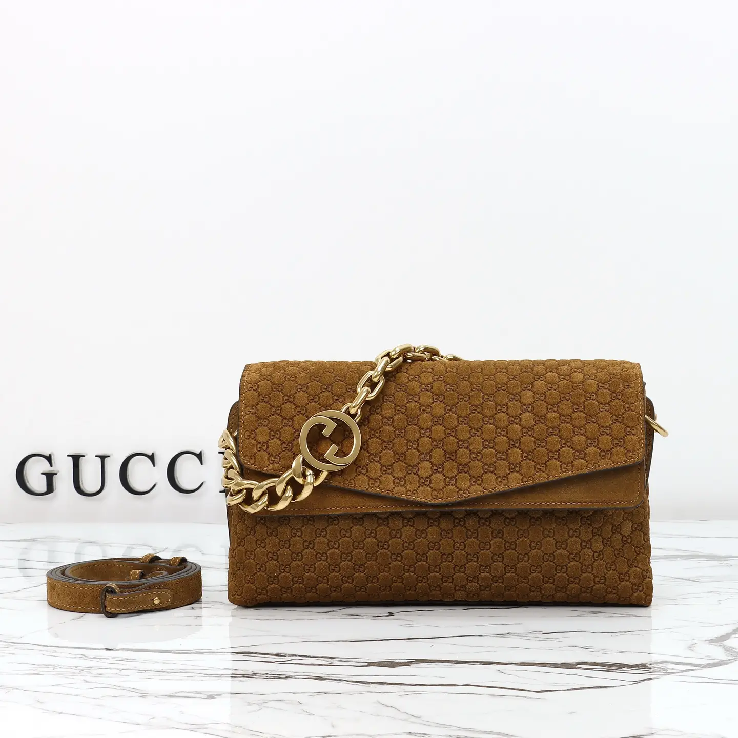 Gucci， Original leather, style 857622 brown frosted embossed size: width